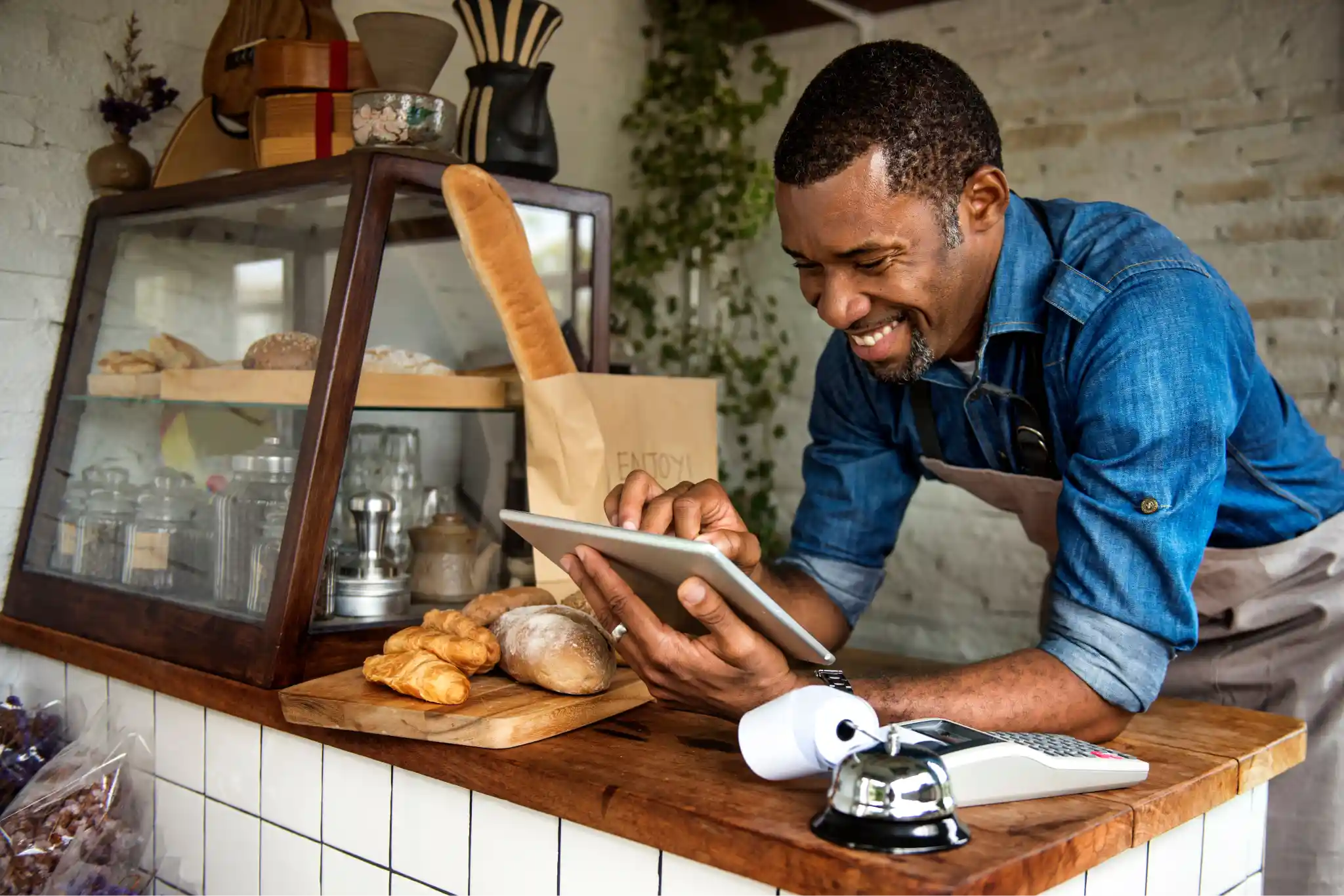 CardPointe merchant on tablet — CardConnect payment portal for small business owners
